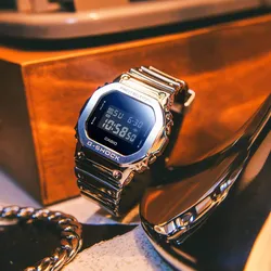 G-Shock GM-5600YM-8 אחריות יבואן רשמי שעון יד ג׳י שוק דיגיטלי מסגרת מתכת בצבע כסף עם רצועת סיליקון