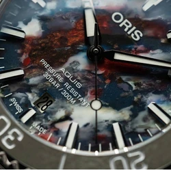 Oris 0173377664150-Set אחריות יבואן רשמי l שעון יד אוריס לוח עשוי מבקבוקי פלסטיק ממוחזרים l מסדרת שעוני Aquis Date Oris אוטומטי l